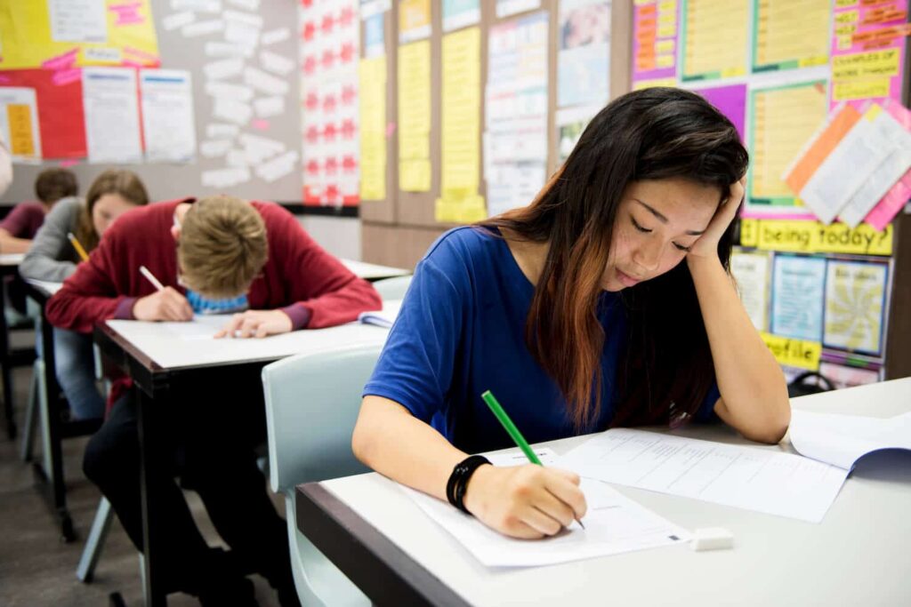 Students taking test in classroom