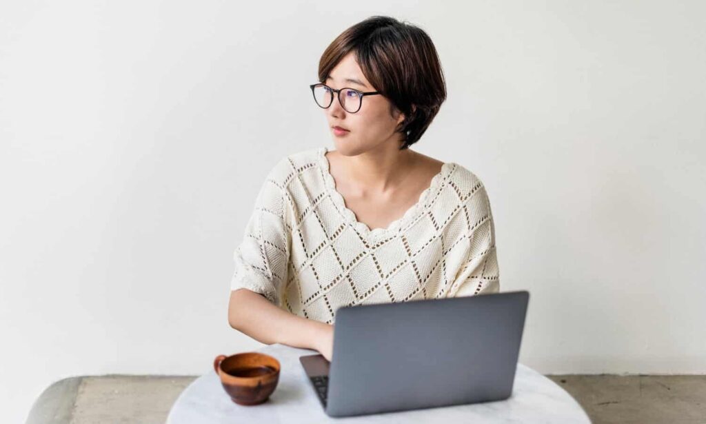 Student browsing laptop